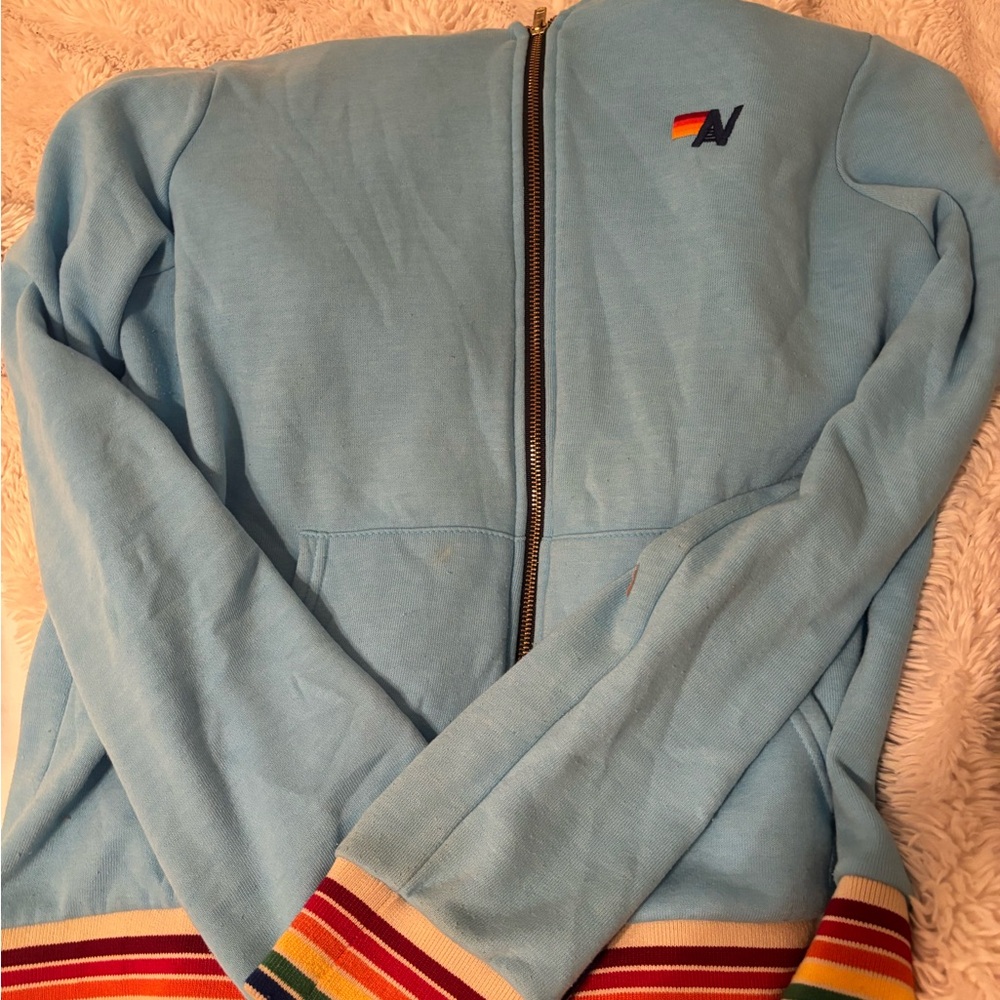 Blue Zip-Up Hoodie with Rainbow Stripes Aviator Nation
